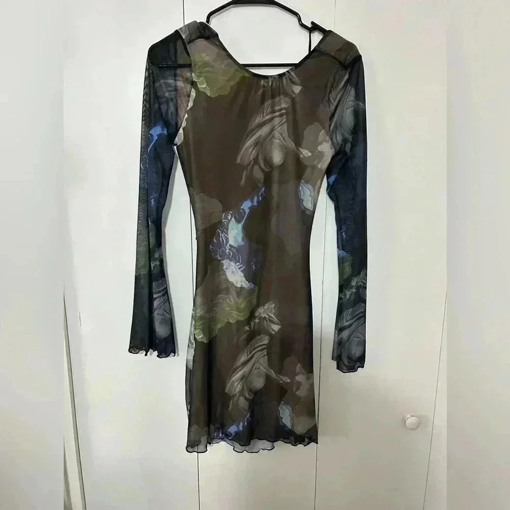 White fox long sleeve open back women’s dress